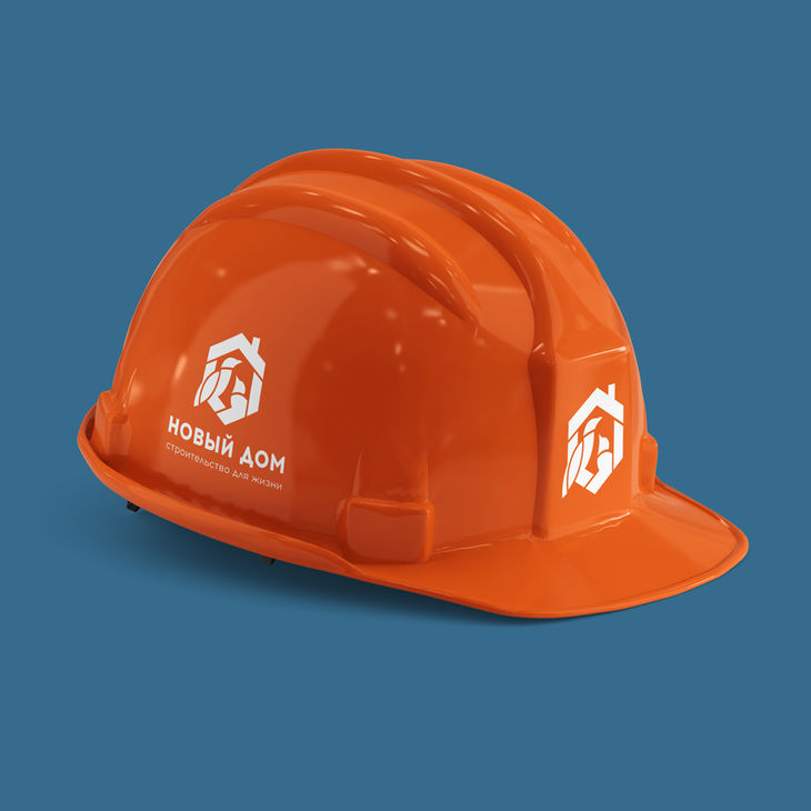 Логотип строительной компании Новый дом. Нанесение на строительную каску